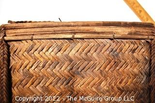 19th Century Prairie, Plains and Plateau Native American Herringbone Weave Child's Pack Basket with Back Straps. 