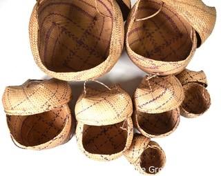 Set of Seven (7) Native American Nesting Baskets Woven with Purple Stripe, Lids and Handles. 