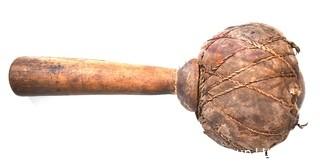 19th Century Prairie, Plains and Plateau Native American Drum Beater Made of Twine Wrapped Muslin with Wood Handle.  8"