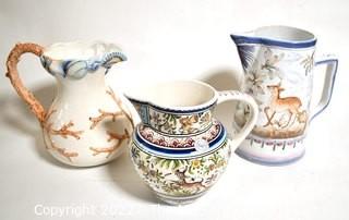 Three (3) Hand Painted Porcelain Pitchers Made in Italy and Portugal. 