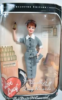 Two (2) New in Box Lucille Ball Toy Dolls Made by Mattel and One (1) New in Package Adult Costume.