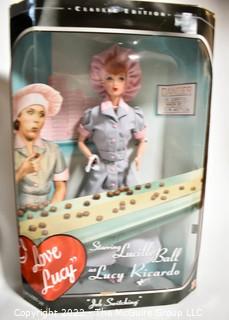 Two (2) New in Box Lucille Ball Toy Dolls Made by Mattel and One (1) New in Package Adult Costume.