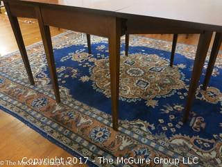 Mahogany drop leaf dining table. Collapses to fit almost anywhere, can open to fit six. Great for apartment/condo; center 24 x 48W; each leaf 24 x 48"; 30 1/2"T