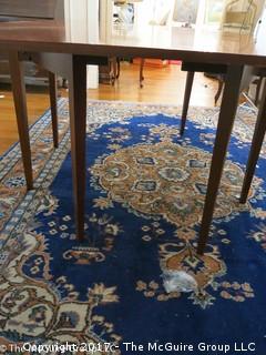 Mahogany drop leaf dining table. Collapses to fit almost anywhere, can open to fit six. Great for apartment/condo; center 24 x 48W; each leaf 24 x 48"; 30 1/2"T