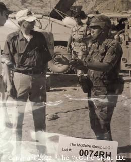 Photo of General Coffey and Tom Clancy Taken by John Gresham. Briefing of NTC Operations. 8" x 10".