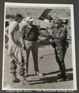 Photo of General Coffey and Tom Clancy Taken by John Gresham. Briefing of NTC Operations. 8" x 10".