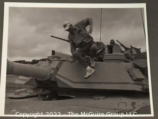 Photo of Tom Clancy Taken by John Gresham Dismounting Tank at Ft. Hood Texas.