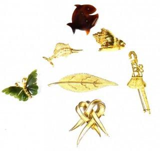 Collection of Gold Tone Vintage Brooches.  