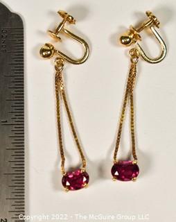 14Kt Yellow Gold with Ruby Screw Back Dangle Earrings.  Weighs 3 grams. 