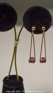 14Kt Yellow Gold with Ruby Screw Back Dangle Earrings.  Weighs 3 grams. 