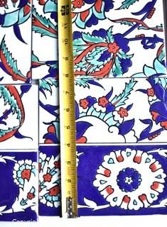 Set of individual 8" Hand Painted Blue & White Glazed Ceramic Tiles that Form a Backsplash Art Panel.   31" x 87".