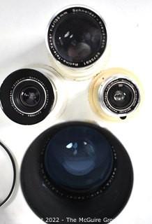 Collection of Camera Lenes in Cases.  Includes Schneider Kreuznach Retina Curtagon.