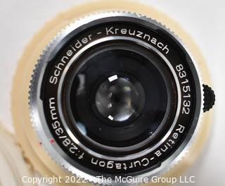 Collection of Camera Lenes in Cases.  Includes Schneider Kreuznach Retina Curtagon.