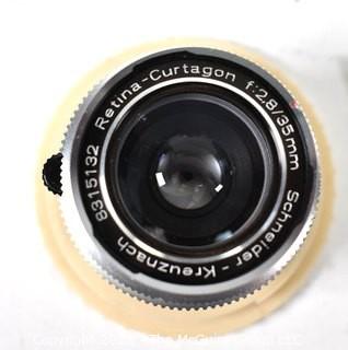 Collection of Camera Lenes in Cases.  Includes Schneider Kreuznach Retina Curtagon.