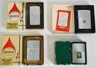 Three (3) Vintage Zippo Lighters and 1 knife. New in Boxes (NIB). {Description was altered 3-17-22 @12:58pm ET}