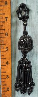 Victorian French Jet Beaded Tassel Applique Mourning Trim.  This is attached to a fabric backing but can be easily removed.  7" long