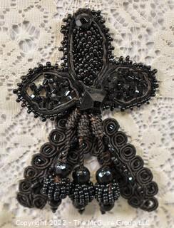 Victorian French Jet Beaded Lace Applique Embellishment or Mourning Trim.  This is attached to a White Lace backing but can be easily removed.  4 1/2"" long