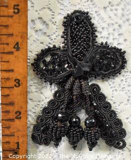 Victorian French Jet Beaded Lace Applique Embellishment or Mourning Trim.  This is attached to a White Lace backing but can be easily removed.  4 1/2"" long