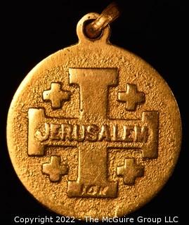 14K Gold Medallian marked "Jerusalem". 2.1g