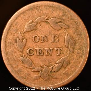 Two (2) very worn Liberty Head One Cent coins including 1860(?).