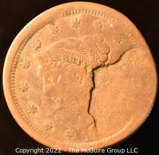 Two (2) very worn Liberty Head One Cent coins including 1860(?).