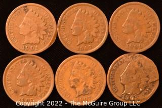 (6) Indian Head Pennies: 1-1901; 1-1902; 1-1906; 3-1907.  (The 1902 coin has been altered so that the obverse and verso are two obverses melded together) {Description was altered 3-17-22 @ 1:04pm ET}