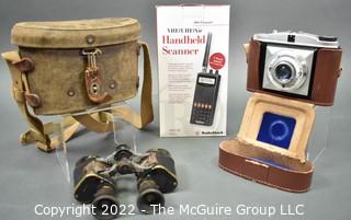 Antique Binoculars in Canvas Case, Handheld Scanner and Baldinette Camera.