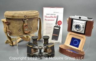 Antique Binoculars in Canvas Case, Handheld Scanner and Baldinette Camera.