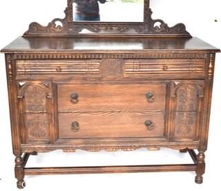 Carved Mahogany Two Drawer Dresser with Mirror.