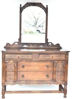 Carved Mahogany Two Drawer Dresser with Mirror.