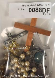 Group of Religious Jewelry Including Rosary Beads and Crucifixes.