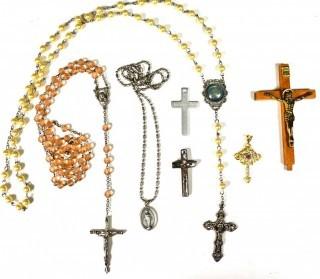 Group of Religious Jewelry Including Rosary Beads and Crucifixes.