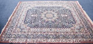 Vintage Machine Made Persian Style 100% Wool Rug on Blue Ground. Royal Carpet Factory Madrid Spain 1976. Measures 8' 4" x 9' 9" Includes new 100% wool carpet pad w/skid-resistant side. Excellent Condition. Moth-proofed. Contains 21 different colors of wool!