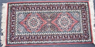 Vintage Machine Made 100% Wool Persian Style Rug on Sienna Back Ground. Royal Carpet Factory Madrid Spain 1976. Measures 3'5" x 4'5" Includes new 100% wool carpet pad w/skid-resistant side. Very Good Condition. Moth-proofed.