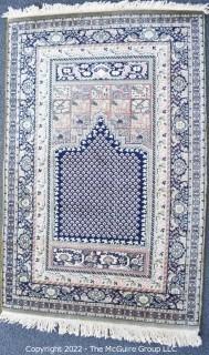 Vintage 100% Wool Machine Made Prayer Rug Style on Blue Ground. Royal Carpet Factory Madrid Spain 1976. Measures 3' 3" x 5' 1". Includes new 100% wool carpet pad w/skid-resistant side. Fair-Good condition. Moth-proofed.