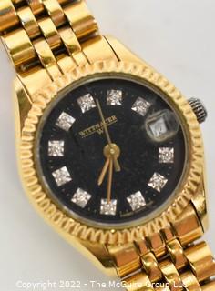 Vintage Wittnauer Men's Swiss Made Gold Tone 11 Diamonds Quartz Calendar Watch With Date Window at 3 o'clock. Working 