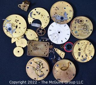 Assortment of pocket watch movements, dials and misc. parts 