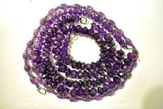 Four (4) Strands of Faceted Amethyst Beads.