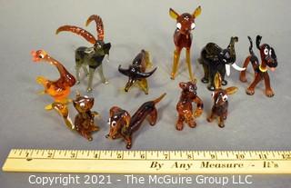 A Glass Menagerie of Brown Hand Blown Animal Figurines. 