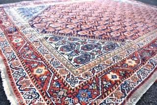 Vintage Wool Hand-Knotted Rug with Border Blue on Red Ground.   Measures 52" x 80".