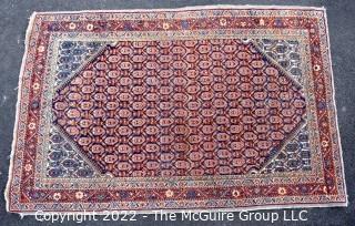 Vintage Wool Hand-Knotted Rug with Border Blue on Red Ground.   Measures 52" x 80".