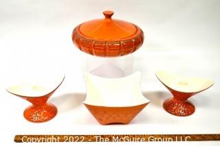 Four (4) Pieces of Orange Mid Century Modern Pottery by Shawnee and Royal Haeger 