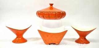 Four (4) Pieces of Orange Mid Century Modern Pottery by Shawnee and Royal Haeger 