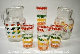 Set of Mid Century Bright Stripe Glassware and Pitchers.