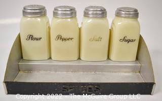 Four (4) Vintage Art Deco Milk Glass Spice Jars with Wall Mount Rack.