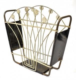 Vintage Art Deco Black Painted Cast Iron Magazine Rack. Measures 5" x 14" x 15".