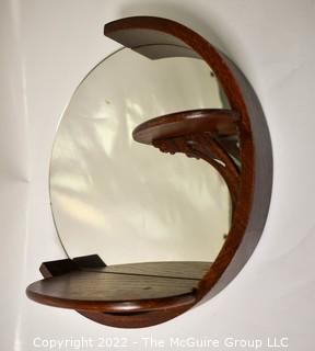 Vintage Art Deco Round Scroll Products Wall Mirror. 11" diameter.