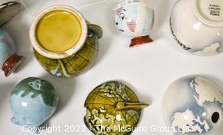 Group of Seven (7) Vintage Ceramic Globe Items. 