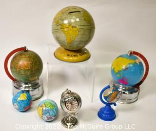 Group of Vintage Globes Banks, Clock and Toys.