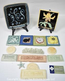 Group of Unique Hand-Painted Tiles and Textured Border Tiles.